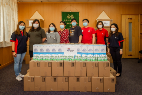 group of people with parcels that JARDINE MATHESON DONATED PPE & HAND SANITISER TO HONG KONG COMMUNITIES